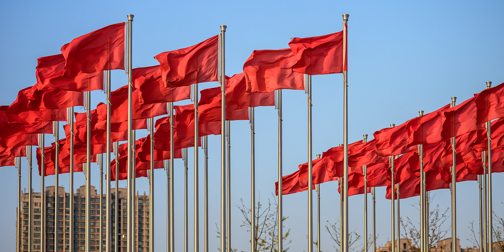 Red flags wave, hearts unite